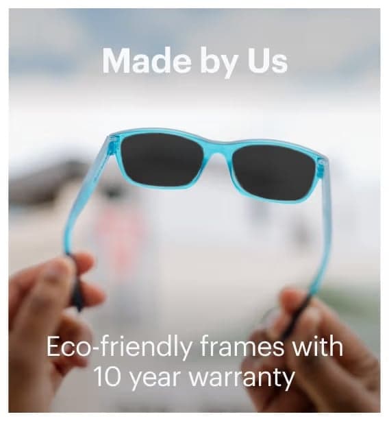 Dresden Vision sunglasses placed on wooden post by the beach highlighting lightweight and durable frame design