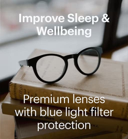 Dresden Vision glasses placed on books highlighting blue light filter lenses for screen use and eye comfort