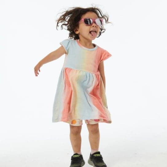 A happy child wearing Dresden Vision Canadas kids glasses, perfect for everyday adventures. Find affordable and eco-friendly childrens eyewear with durable frames and clear vision lenses.