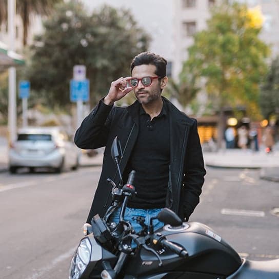 Elderly couple wearing stylish glasses, showcasing Dresden Vision Australia's comfortable, durable, and affordable Australian-made eyewear designed for seniors.